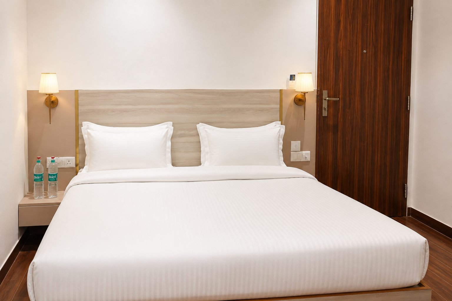 Bed facing the room entry door