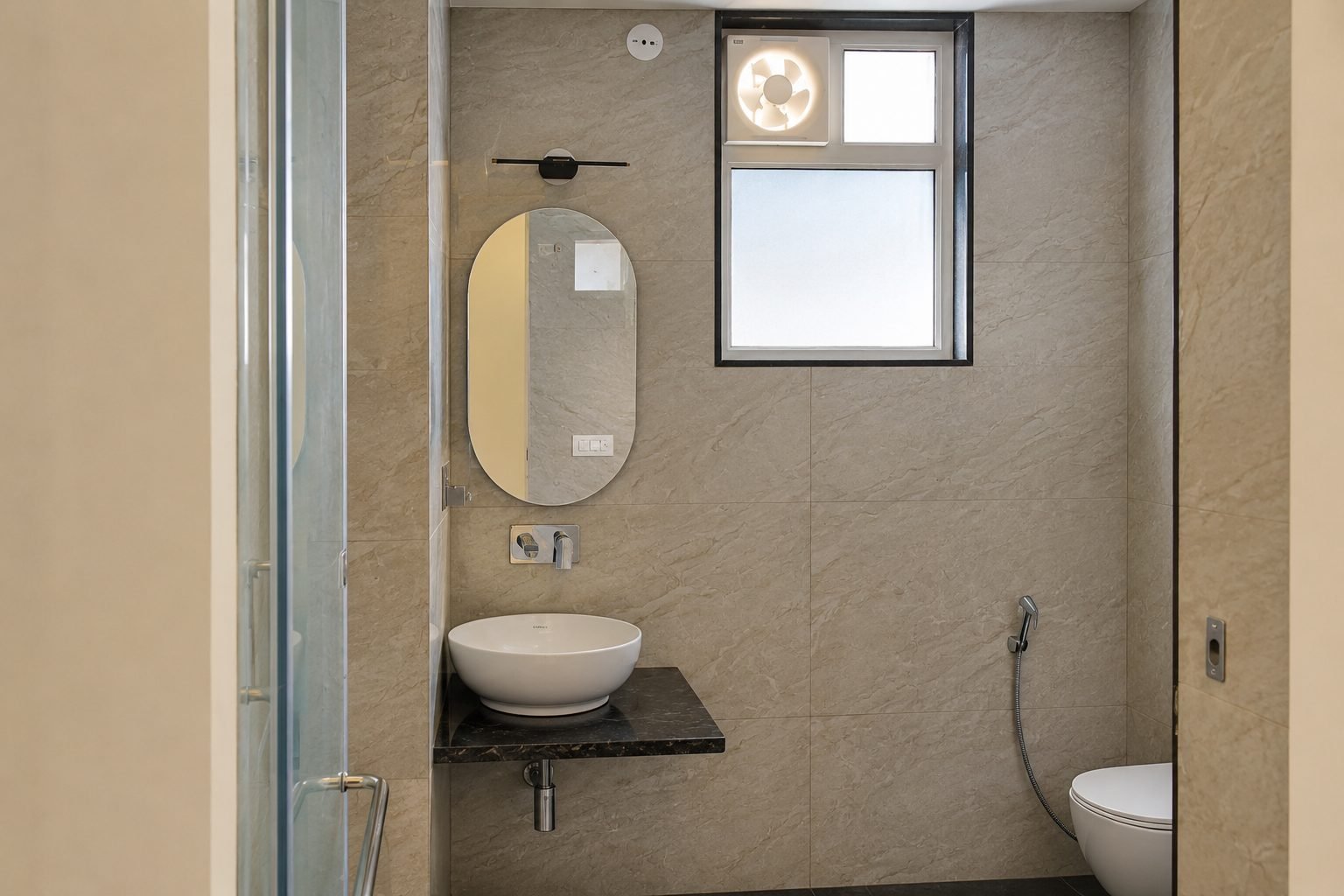 Bathroom mirror and window at Hotel Sez Park